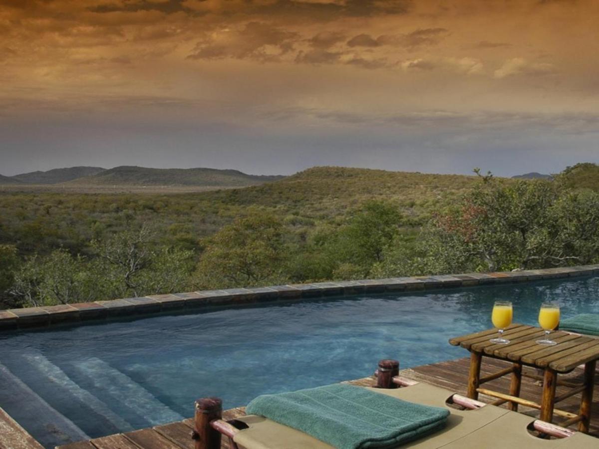 Buffalo Ridge Safari Lodge Madikwe Game Reserve Extérieur photo